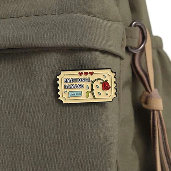 Yellow with red rose raffle ticket Emotional Damage Book Club enamel pin bag hat - Picture 1 of 6